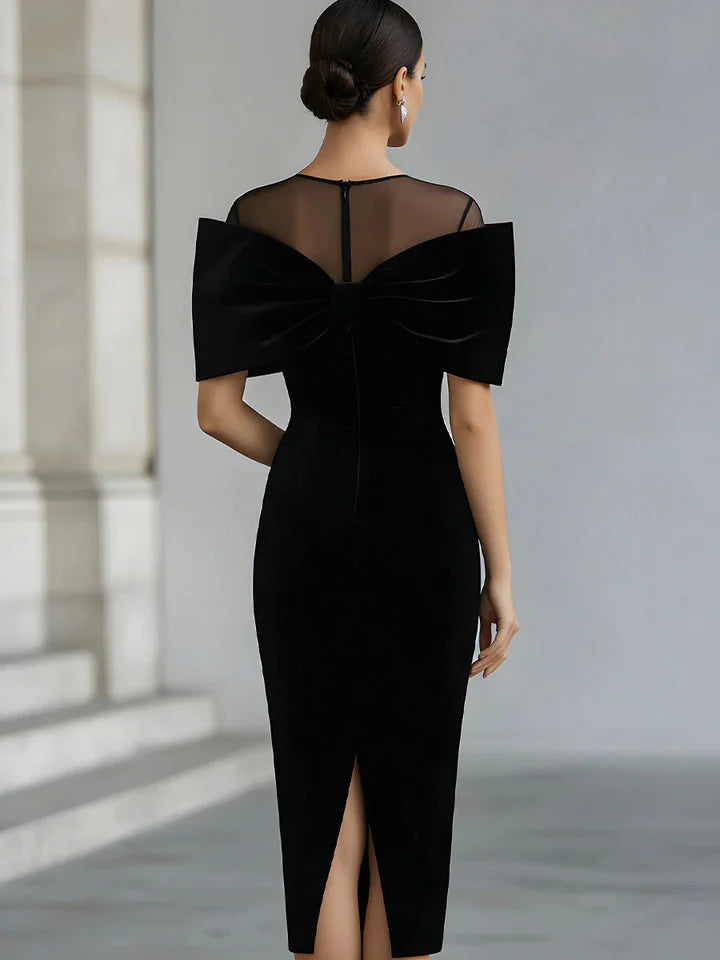Vestido midi de terciopelo negro dramático con lazo