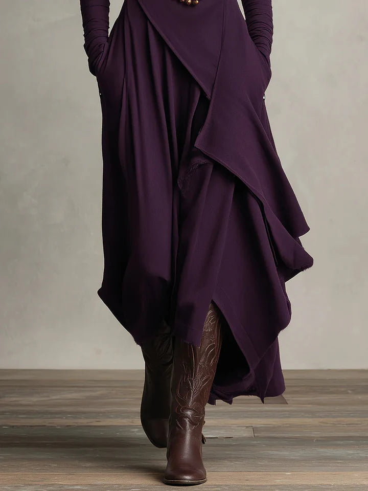 Vestido largo plisado asimétrico con cuello alto