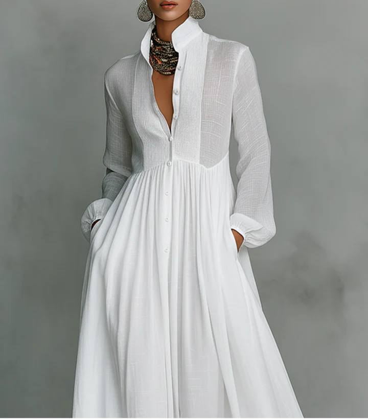 Maxi minimalista de algodón y lino con patchwork, cuello alto y mangas largas