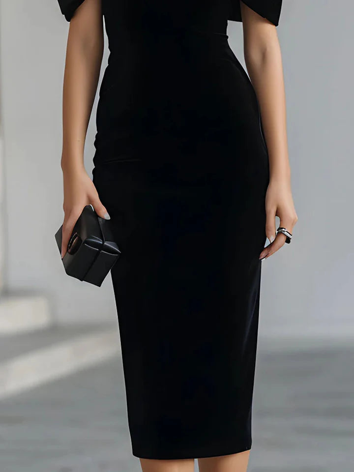 Vestido midi de terciopelo negro dramático con lazo